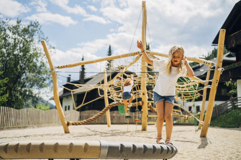 Children's area with climbing tower in the middle of Kirchleitn holiday village in Carinthia